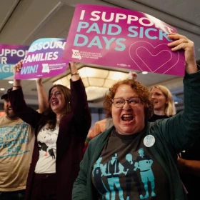 Supporters of Missouri Proposition A, which raises the state's minimum wage to $15 an hour, celebrate the measure passing on Nov. 5 at the Marriott St. Louis Grand in downtown St. Louis. Businesses groups sued on Dec. 6 to block it from taking effect.