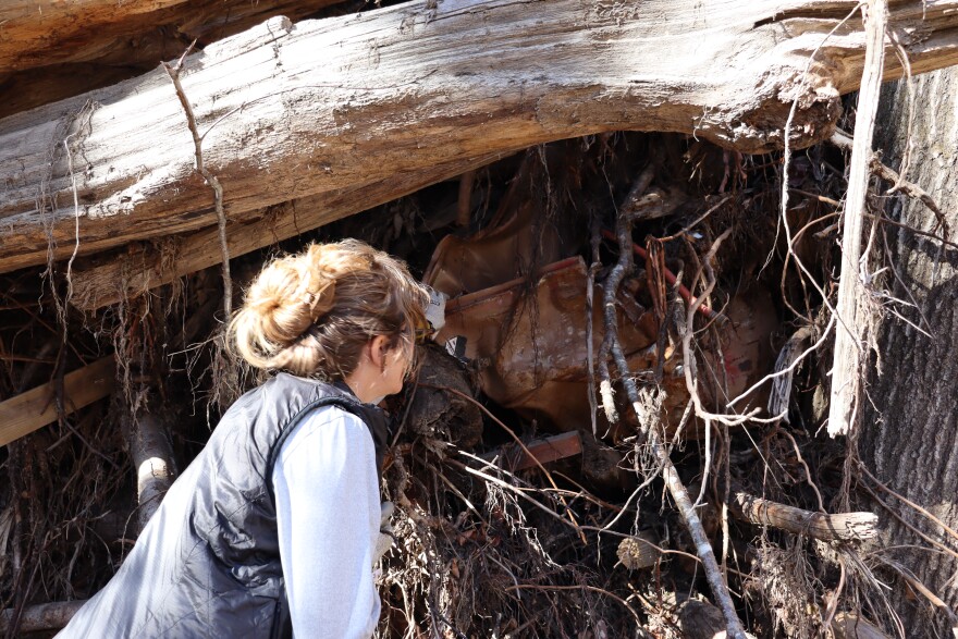 Donovan Green looking at what could be part of a car in a huge pileup on Nov. 12, 2025