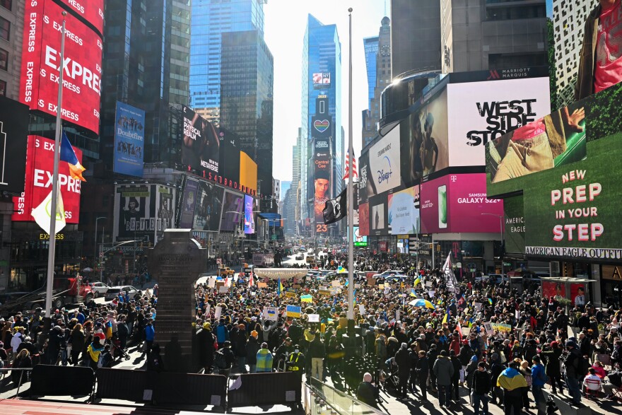 Hundreds of people gather for a "Stand With Ukraine" rally in Times Square on Saturday in New York City. Ukrainians, Ukrainian Americans and allies gathered to show support for Ukraine and protest against the Russian invasion.