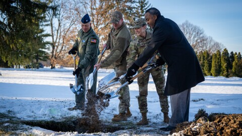 Pictured are Col. Dustin Richards, 88th Air Base Wing and Installation Commander, Col. Marietta Sanders, 88th Mission Support Group Commander, Col. Michael Frayser, 88th Medical Group Commander, and Amir Mott, 88th Civil Engineering director, took part in the 88th Air Base Wing Time Capsule Burial Ceremony Dec. 16, 2025, at Wright-Patterson Air Force Base, Ohio. The event marked the burial of a new time capsule, following the opening of the previous one from 1999 earlier this year.