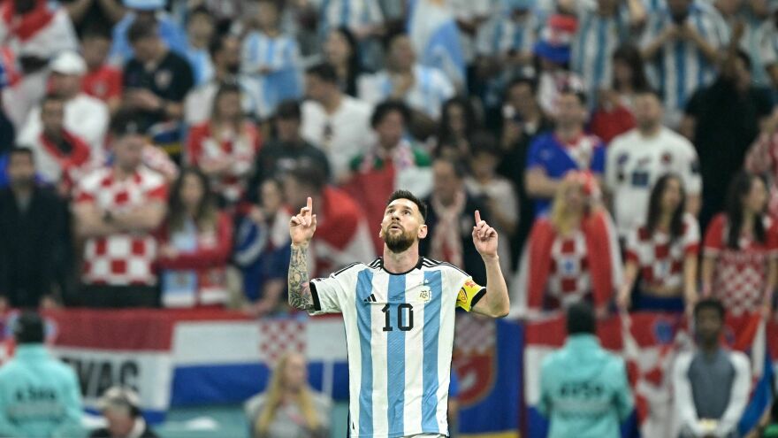 Argentina forward Lionel Messi celebrates scoring his team's first goal from the penalty spot during the World Cup semifinal match between Argentina and Croatia in Qatar on December 13, 2022.