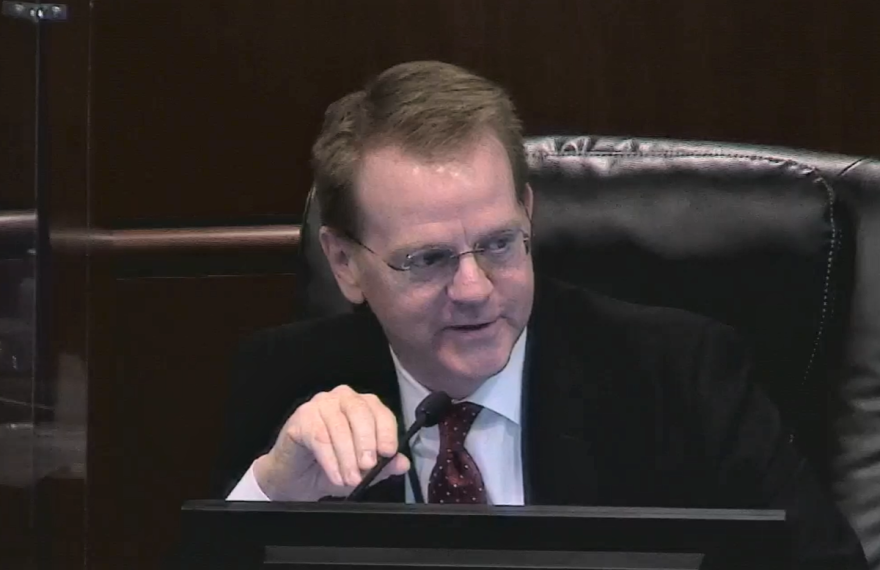 Lake County Manager Jeff Cole, who has announced his retirement, reacts to compliments from speakers during Tuesday's County Commission meeting. Image: Lake County video