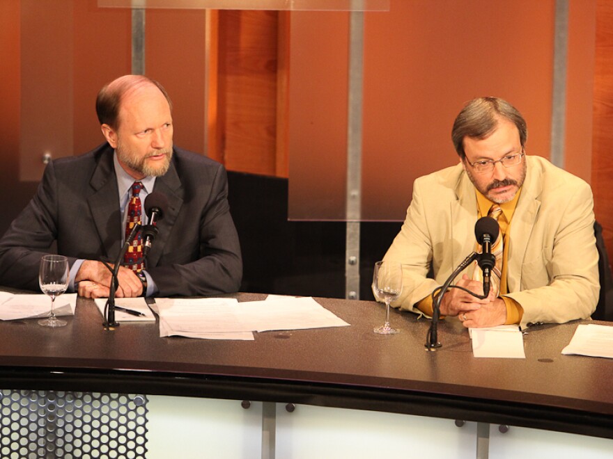 David Keating, president for the Center for Competitive Politics (left), and columnist Jacob Sullum argue for the motion, "Money In Politics Is Still Overregulated."