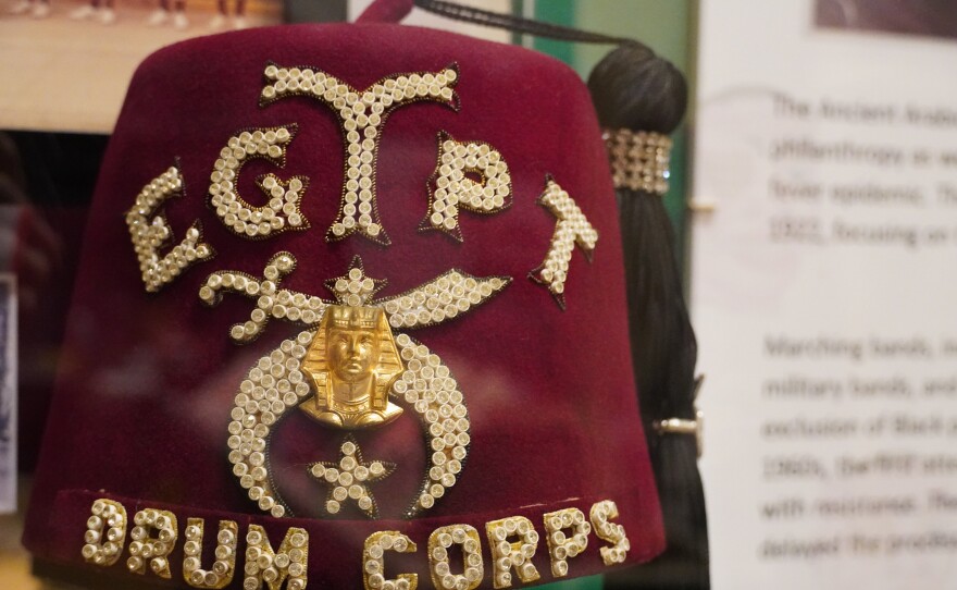 Red hat that says Egypt Drum Corps on it 