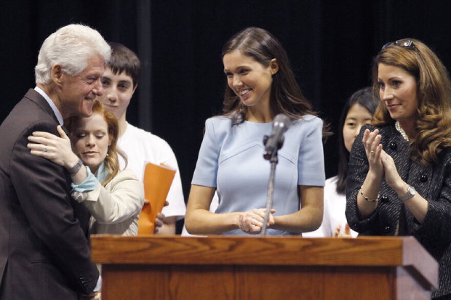 Clinton greeted Tresine Logsdon, left, Bluegrass Youth Sustainability Council teacher facilitator, Henry Clay senior Jane Brady Knight, who invited Clinton to the event, and Secretary of State Alison Lundergan Grimes.