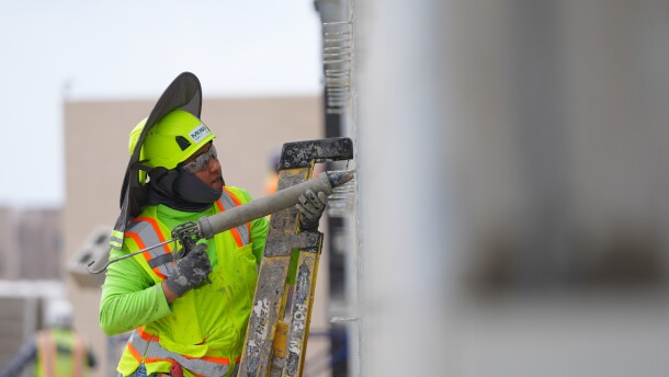 Jennyfer Belehez works construction at Mansfield Stadium chosen as a team base camp training site for the 2026 FIFA World Cup soccer teams, in Mansfield, Texas, Wednesday, March 4, 2026. (AP Photo/LM Otero)