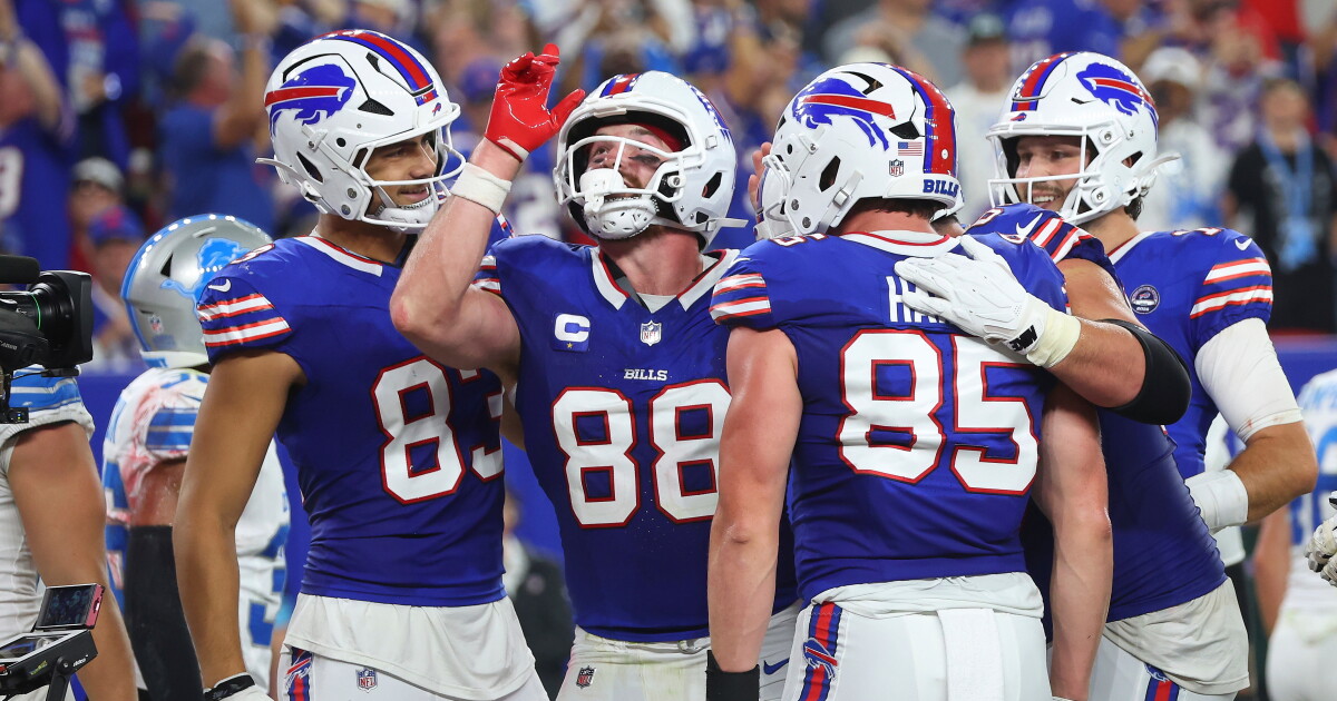 Buffalo Bills tight end Dawson Knox (88) celebrates his touchdown reception against the Detroit Lions during the first half