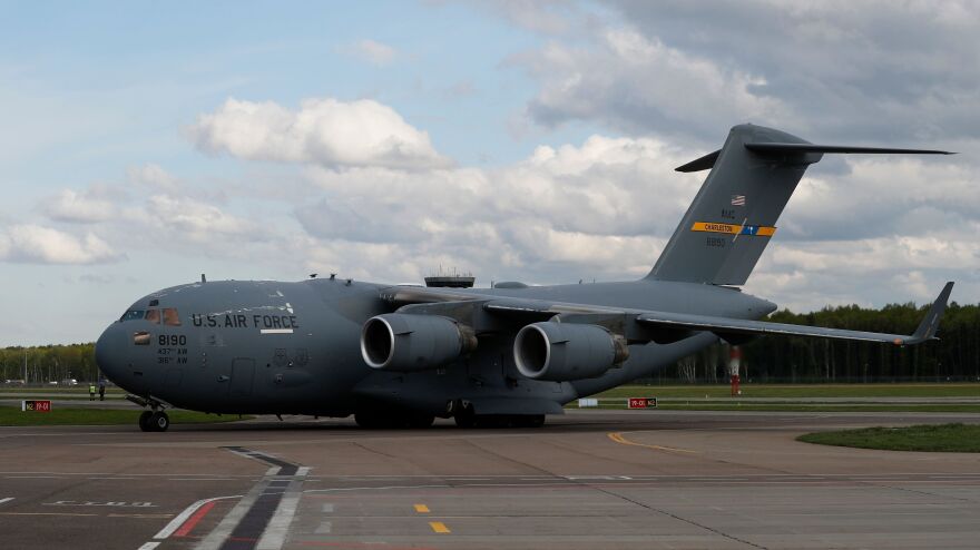 A U.S. Air Force C-17 Globemaster transport plane carrying medical supplies lands in Moscow in May 2020. The same type of plane airlifted refugees from Afghanistan this past week — one of whom gave birth on the aircraft.