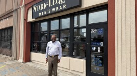 Michael Benton, owner of Stark and Legum, stands outside his storefront on Granby Street in Norfolk. Benton says a new city grant program is only a temporary fix for NEON District businesses.