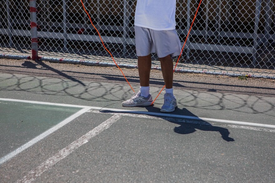 An inmate jumps rope in the courtyard at San Quentin State Prison on July 26, 2023.