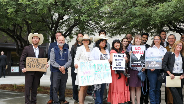 Anti-wall advocates and plantiffs gather for a group photo outside of a federal courthouse in El Paso on Friday, October 2.