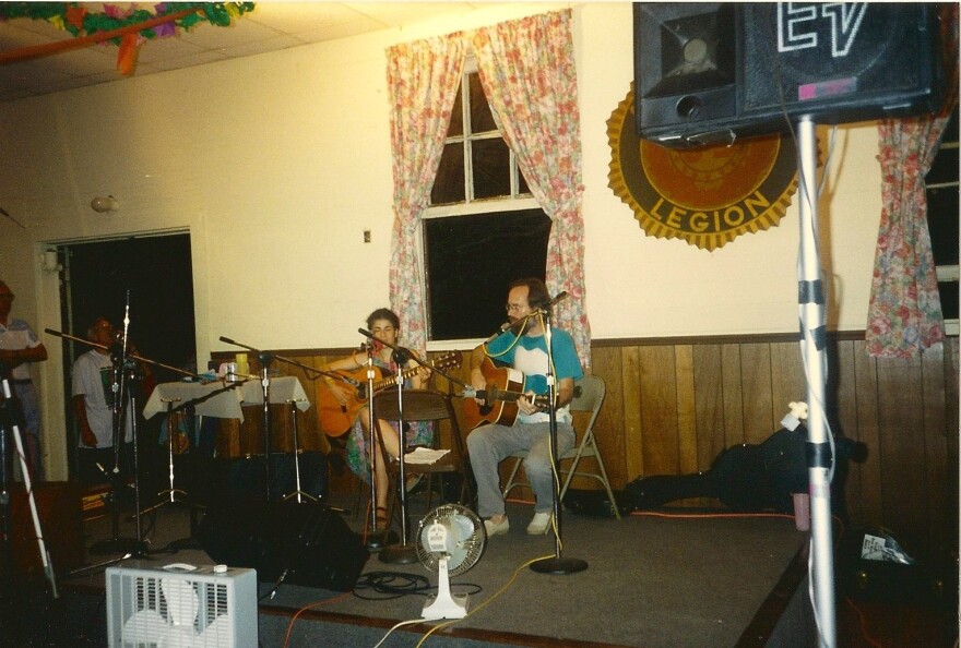 Gloria and Michael Bauermeister perform a song during a benefit at the local American Legion Hall in Augusta. The community put together the benefit for Michael after he fell off of a ladder and broke his back in June 1993. June, 1993.