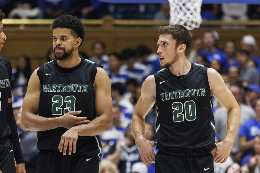 Dartmouth's Robert McRae III (23) and Romeo Myrthil (20) walk onto the court during the second half of an NCAA college basketball game against Duke in Durham, N.C., Monday, Nov. 6, 2023. Men's basketball players for Dartmouth are attempting to unionize, filing a petition with the National Labor Relations Board in September. (AP Photo/Ben McKeown)