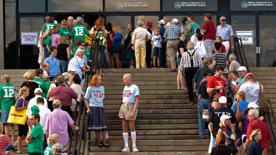 Voters line up outside the Hilton Coliseum at Iowa State University on Aug. 13, 2011, to vote in the Iowa Straw Poll.