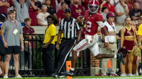 Alabama quarterback Keelon Russell (12) runs into the end zone for a 57-yard touchdown run against Florida State during the second half of an NCAA college football game Saturday, Sept. 19, 2026, in Tuscaloosa, Ala. (AP Photo/Vasha Hunt)