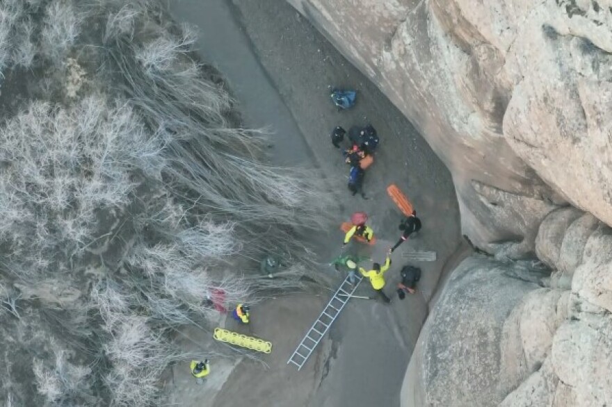 This image taken from drone footage provided by Grand County Search and Rescue shows a man being freed from quicksand Sunday, Dec. 7, 2025, in Arches National Park in eastern Utah.