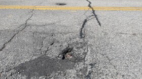 A pothole in Downtown Evansville