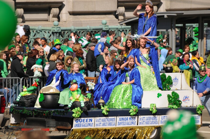 A crowd watches a float in the St. Patrick's Day parade in Cleveland in 2010.