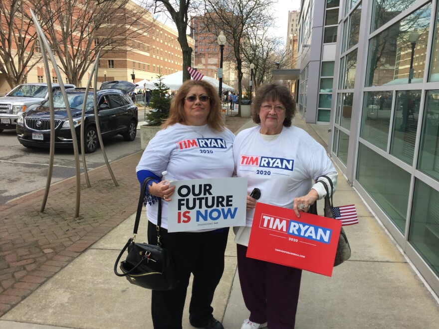 Joan Murphy (left) and Mary Cummins said they find Congressman Tim Ryan to be a lot like President John F. Kennedy. After his speech on Saturday, Ryan told reporters he admired Kennedy for his vision for America. [Kabir Bhatia / WKSU]