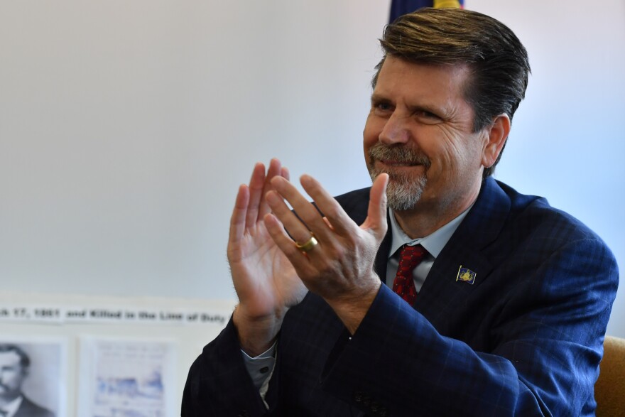 U.S. Rep. Jeff Olsommer, R-PA, claps for Joseph Drake at a ceremony at the Wayne County Courthouse in Honesdale.