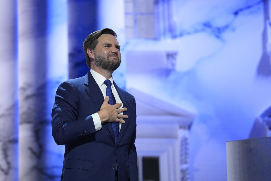 Republican vice presidential candidate Sen. JD Vance, R-Ohio, stands on stage after speaking at the third day of the Republican National Convention.