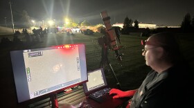 A Central Valley Astronomer astrophotographer set up his area with a screen to show off precisely what could be viewed through his telescope with a 5 minute exposure time.