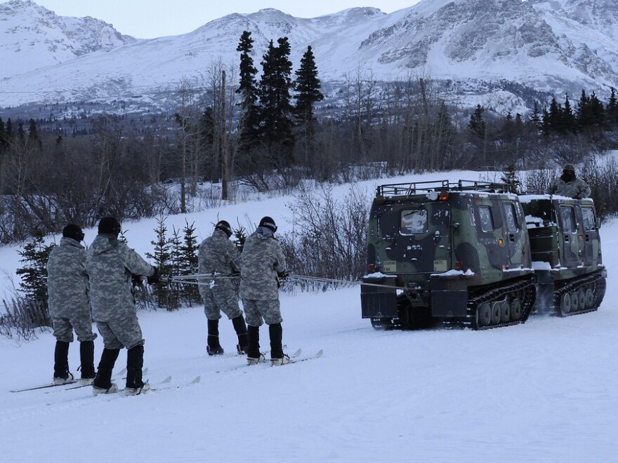 Northern Warfare Training Center instructors demonstrate skijoring using a vehicle last year in Alaska.