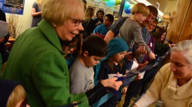 Kodiak Mayor Pat Branson cutting the ribbon on Kodiak’s Public Library in 2013. Branson will be among 10 women inducted into the Alaska Women’s Hall of Fame this fall. (Photo: James Brooks/Creative Commons)