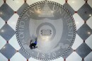 FILE - Pedestrians pass oner the crest for The Ohio State University's in the campus student union on May 18, 2019, in Columbus, Ohio. 