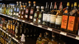 Shelves display bottles of tequila for sale at a liquor store