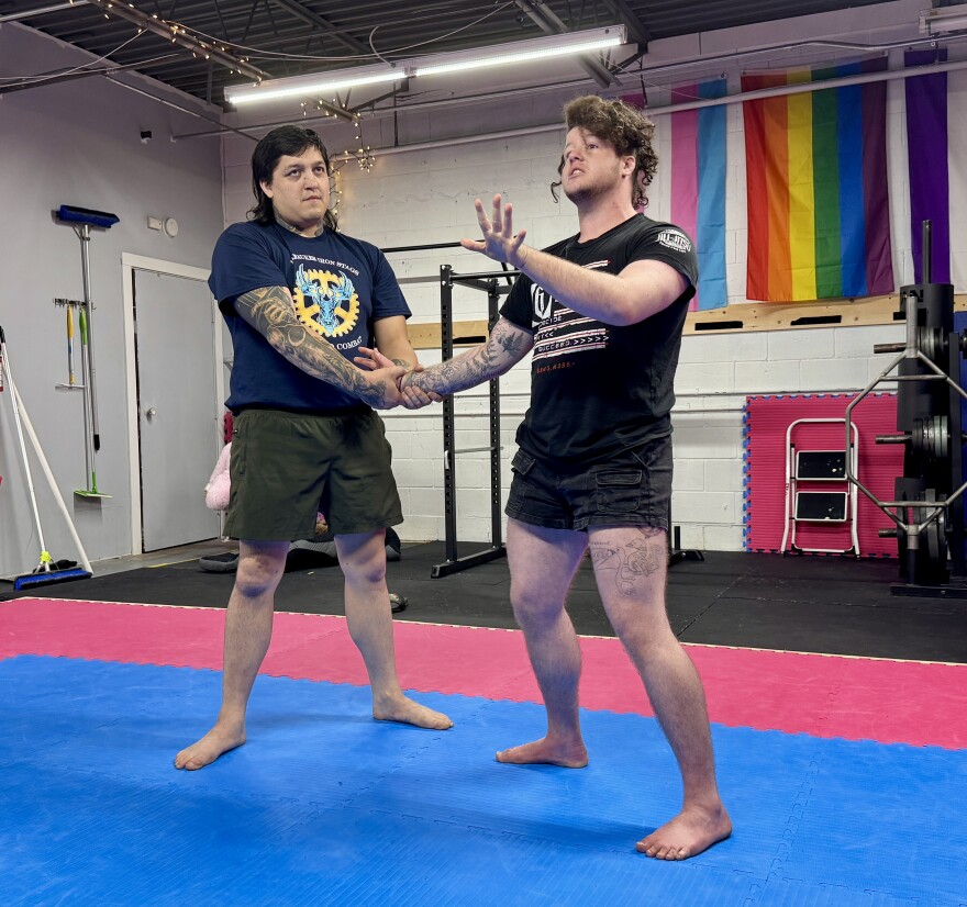 Talon Howard and Oswin Tyrann teaching self defense at FitPower