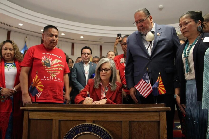 Arizona Gov. Katie Hobbs signs the Turquoise Alert legislation into law on May 21, 2025.