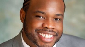 Vauhxx Booker, a local civil rights activist and member of the Monroe County Human Rights Commission, said five white men pinned him against a tree, shouted racial slurs and one of them threatened to “get a noose.”