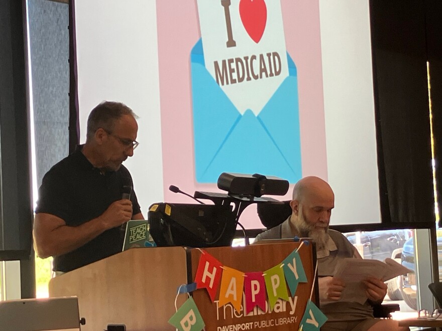 Retired physician Dr. Jim Kettelkamp of Iowa City speaks at the Medicare and Medicaid forum July 29, 2026 at Davenport Public Library's Eastern Avenue branch.