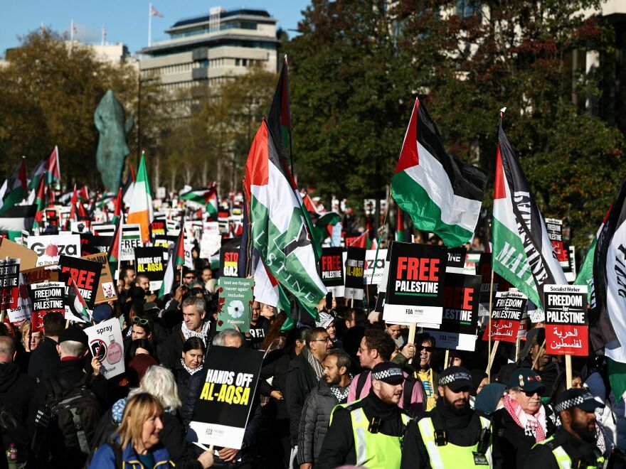 Protesters march in central London on Saturday, calling for a cease-fire in the conflict between Israel and Hamas.