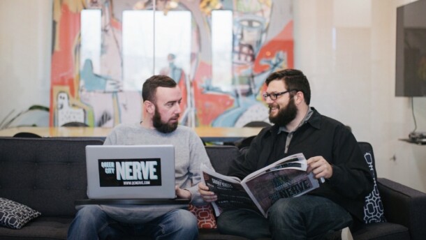 Ryan Pitkin (left), Queen City Nerve's editor-in-chief, sits alongside the paper's publisher, Justin LaFrancois.