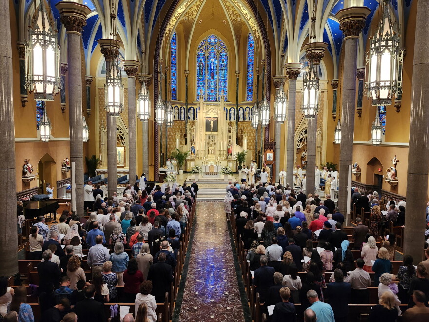 A high view of the inside of a cathedral.