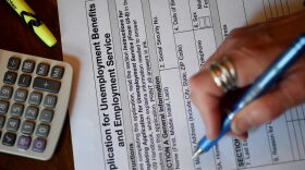 A person files an application for unemployment benefits in Arlington, Virginia.