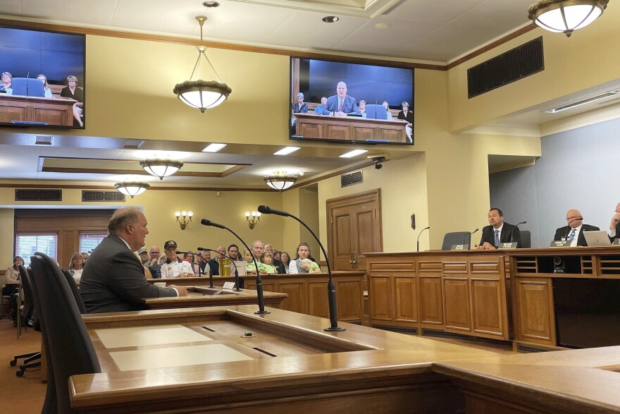 Former Wisconsin Supreme Court Justice Michael Gableman, left, testifies at a Senate elections committee hearing in Madison, Wis., Tuesday, Aug. 29, 2023, against reappointing Meagan Wolfe as administrator of the Wisconsin Elections Commission. Gableman led a Republican-ordered, 16-month investigation into the results of the 2020 election in Wisconsin that turned up no evidence of widespread voter fraud before he was fired.