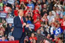 Former President Donald Trump, the Republican nominee for president, applauds during his rally at Riverfront Sports in Scranton on Wednesday.
