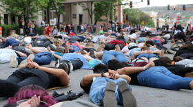 Hundreds of people lie on N 27th St. and Second Ave. N in protest of police brutality at the Justice for George Floyd & Black, Indigenous and People of Color In Our Community/World in Billings June 7, 2020. 