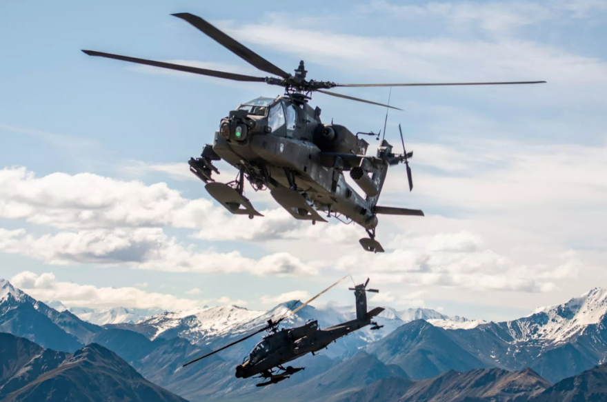 The Army's last week released a report on its investigation into the April 27 crash of two Army Apache AH-64D helicopters like these in a mountainous area 60 miles south of Fairbanks.