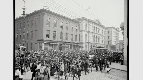 The 1905 Emancipation Day parade makes its way down Main Street in Richmond, Virginia, with a streetcar sitting in the middle of the crowd. At the time of this photograph, Black Richmonders were in the midst of a sustained boycott of the city’s segregated streetcars, walking to school, work, and church rather than paying for second-class treatment. The parade tied the history of emancipation to their ongoing fight for dignity and full citizenship.