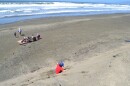 A child plays on an engineered dune at Ocean Beach
