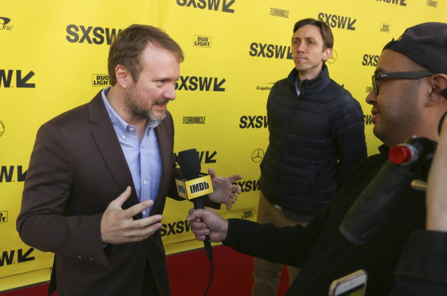 Rian Johnson arrives for the world premiere of "The Director and The Jedi" during the South by Southwest Film Festival at the Paramount Theatre on Monday, March 12, 2018, in Austin, Texas. (Jack Plunkett/Invision/AP)