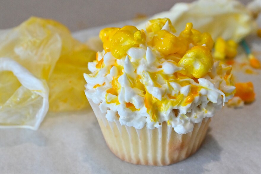 Students created cupcakes that look like they're topped with popcorn.