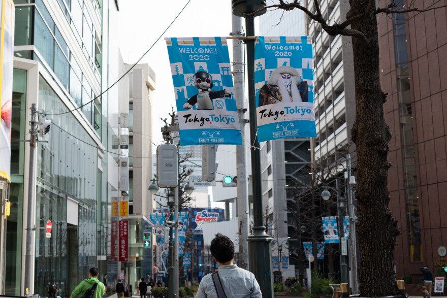 Signs for the 2020 Olympics adorn the streets of Tokyo. Both the Olympics and the torch relay are postponed due to the global spread of the coronavirus.