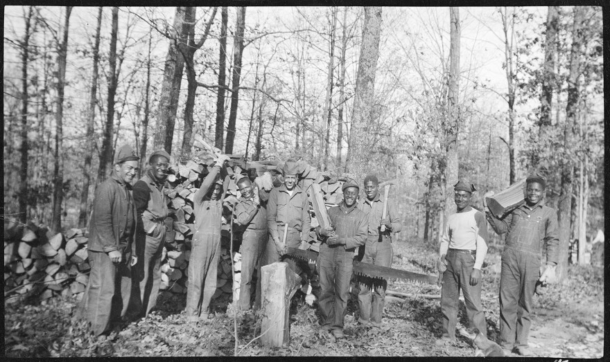 CCC enrollees: Group of CCC enrollees sawing wood in forest clean-up, 1935, Civilian Conservation Corps in Mammoth Cave National Park.