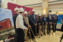 Thursday's groundbreaking ceremony had to be moved indoors due to the rain.