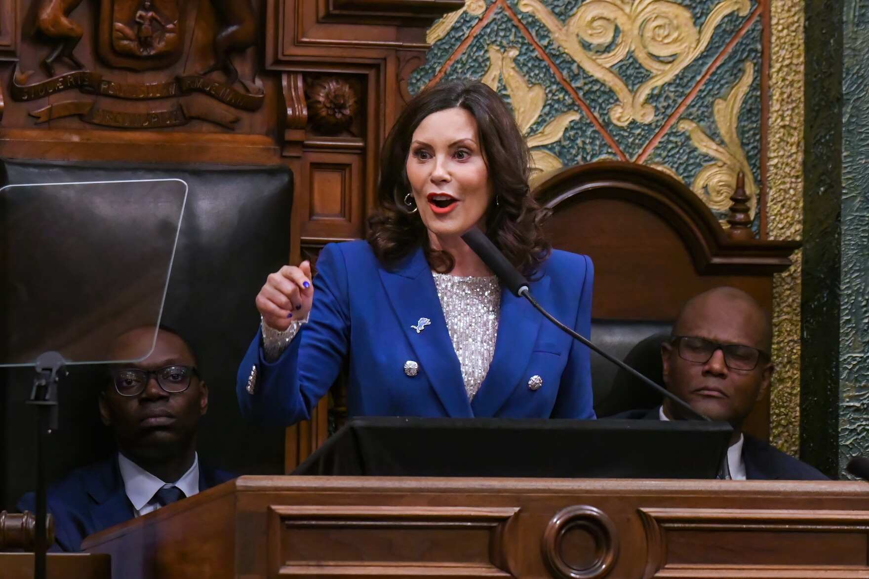 Whitmer signs new minimum wage, banked leave policies